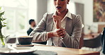 Business woman, hands and wrist pain in lobby with coffee break, joint injury or carpal tunnel. Work trip, strain and employee with inflammation, massage and ache for arthritis or muscle tension