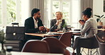 Hotel, lobby and business people in meeting with coffee for convention, planning and networking. Professional, corporate trip and man with women in discussion for conference, seminar or collaboration