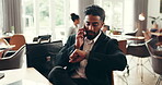 Checking, time and businessman in restaurant, phone call and anxious for delayed meeting or talking. Trip, lawyer and conversation with late client, luggage and chat with mobile for legal advice