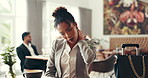 Business woman, travel and neck pain in lobby with coffee, joint injury or fatigue with burnout. Work trip, strain and employee with inflammation, massage and ache for arthritis or muscle tension