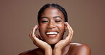 Smile, skincare and hands with face of black woman in studio for beauty, glow and dermatology. Shine, hydration and grooming with person on brown background for self care, cleaning and detox