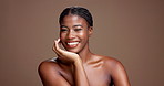 Smile, hydration and hands with face of black woman in studio for beauty, glow and dermatology. Shine, skincare and grooming with person on brown background for self care, cleaning and detox