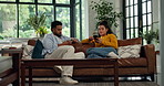 Ignore, phone and couple on sofa with social media addiction on internet, website and online. Dating, home and man with woman on smartphone for reading news, message and notification in living room