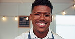 Face, entrepreneur man with smile, cafe or pride for growth of small business, apron or hospitality. Confident, waiter and happy for coffee shop, black person and service for startup, retail or store