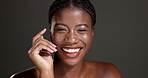 Happy, skincare and hands with face of black woman in studio for glow, dermatology and self care. Mockup space, hydration and aesthetic with female model on dark background for shine and grooming