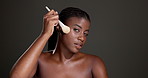 Black woman, makeup brush and face with beauty in studio for application with skin by background. African girl, cosmetics and portrait for foundation, powder and tools with mockup space in Kenya