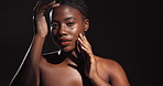 Beauty, face and woman for skincare in studio with natural glow, collagen shine and hydration. Spotlight, mockup and african girl with results for cosmetics treatment or self care on black background