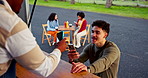 Coffee, food truck and customer with phone to pay for service, drinks and beverage with handshake. Mobile cafe, restaurant and waiter greeting man with takeaway, cappuccino and payment for thank you