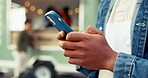 Hands, phone and online with person at food truck for customer experience, promotion post and typing. Restaurant review, vendor rating and social media with man outdoor for mobile coffee shop or van