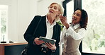 Discussion, tablet and hotel receptionist with woman for accommodation, booking and business trip. Conversation, tech and concierge with guest for hospitality, service or corporate travel check in
