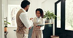 Hotel, concierge and people with tablet fist bump for friendly service, welcome and online checkin. Hospitality, team and happy man with woman on tech for booking, accommodation and reservation