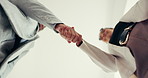 Business people, below and meeting in office for handshake, partnership and collaboration together. Accept, executive director and financial investor with proposal negotiation, promotion or teamwork