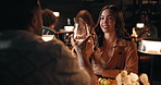 Conversation, date and toast with couple in restaurant at night for bonding or celebration. Fine dining, romance and wine with people at table together for anniversary, cuisine or relationship chat