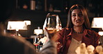 Date, romance and toast with couple in restaurant at night for anniversary, bonding or celebration. Cheers, fine dining and wine with happy people drinking alcohol at table for evening conversation