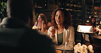 Woman, romance and night with date in restaurant for conversation, romantic dinner or occasion. Female person, talking or speaking in late evening with meal or food for fine dining or chat in cafe