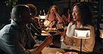 Date, fine dining and toast with couple in restaurant at night for anniversary, bonding or celebration. Cheers, romance and wine with happy people drinking alcohol at table for evening conversation