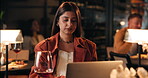 Laptop, remote work and typing of woman in restaurant at night for online planning or research. Computer, reading and wine with freelance employee at fine dining eatery for small business startup