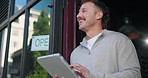 Entrance, tablet and thinking with happy man at coffee shop for management of booking or reservation. App, planning and vision with small business owner in doorway of restaurant for hospitality