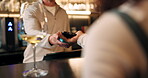 Hands, people and pos with phone payment, transaction and fintech at bar. Bartender, person and machine with mobile for alcohol checkout, purchase drinks and contactless of customer experience at pub