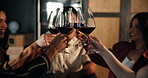 Celebration, hands and toast with friends in restaurant together for dinner party or social event. Cheers, milestone and wine with group of happy people drinking alcohol for nightlife entertainment