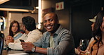 Face, man and phone with message at pub for communication, texting and relax with smile. Happy, person and portrait with smartphone for dating app, online review and networking on social media