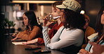 Drinking, wine and relax with woman at bar for club, flavor profile and drinks experience. Alcohol, glass and tasting event with people in restaurant pub for culture, beverage and Chardonnay notes