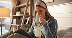 Woman, drinking coffee and writing in notebook on bed for diary entry, inspiration or planning schedule. Morning, girl and journal in bedroom for reflection, to do list and taking notes in apartment