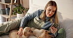 Puppies, dog mom and phone in home bedroom for care, social media or bonding. Pet stroke, adoption and house with golden retriever animals and woman with technology, internet and reading online