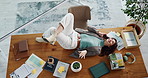 Above, laughing and phone call with woman in office for communication as social media manager. Business, conversation and mobile networking with employee lying on wooden desk in agency workplace