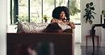 Smile, reading and phone with woman on sofa for social media, blog post and communication app. Newsletter update, connection and calm with person in living room of home for network, search and happy