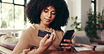 Credit card, phone and relax with woman on sofa for online shopping, digital payment or fintech. Internet banking, account password and customer purchase with person in living room of home for order