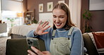 Phone, video call and wave with woman on sofa in living room of home for break or wellness. App, conversation and greeting with happy person in apartment for communication, relax or virtual chatting