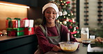 Christmas, baking and face of girl in kitchen with bowl for cookies, dessert and cake recipe. Happy baker, home and portrait of child with ingredients for holiday, festive tradition and xmas treats