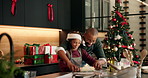 Baking, christmas and father with child in kitchen for bonding, learning or preparing festive cookies. Rolling pin, xmas season and dad teaching kid with cooking for dessert, cake or biscuits in home
