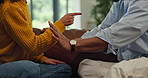 Frustrated couple, hands and argument with fight in disagreement for conflict or breakup in home. Closeup, man and woman with gesture in living room dispute on sofa for toxic relationship or divorce