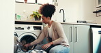 Clothes, laundry and cleaning with woman and washing machine for fabric, hygiene and linen. Loading, housekeeping and cloth with person in washroom of home for cleaner, dryer and domestic chores