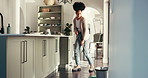 Music, cleaning and black woman with broom in home for dust, hygiene and floor maintenance. Apartment, sanitation and happy person dance with tools for housekeeping, housework and dirt prevention