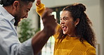 Excited, couple and dance in home with energy, freedom and laugh for anniversary celebration. Living room, man and woman moving to music with love, happiness and romantic moment together with partner