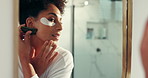 Eye pads, mirror and black woman in bathroom for skincare, beauty and wellness for morning routine. Dermatology, home and person in reflection for grooming, gua sha and cosmetics for anti aging