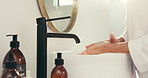 Washing hands, soap and hygiene in bathroom, home and faucet in morning routine, water and skincare. Person, basin and cleaning for dirt, germs or disinfection for bacteria with liquid at apartment