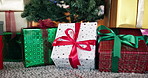 Christmas, boxes and tree with gifts for december holiday, surprise or packages on floor in home. Empty, ribbon and presents in festive celebration for giving, offering or santa parcels in house