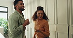Couple, happiness and dancing together in kitchen for celebration, bonding or enjoying music in home. Energy, rhythm and dancer people in apartment, moving to radio and fun in relationship with smile
