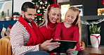 Parents, kid and phone on Christmas at house for social media, browsing internet and gift search. Family, child and mobile for present decision, online shopping and bonding together on festive season