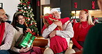 Smile, child and hug grandfather on Christmas, holiday celebration and bonding together. People, big family and embrace for gift giving, xmas party and gratitude for reunion of festive event in home