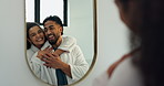 Happy couple, hug or mirror with love in bathroom for grooming, skincare or beauty together in home. Man, woman and embrace with smile or reflection in robe for hygiene or spa treatment in house
