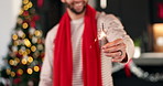 Hand, man and sparkler for Christmas celebration, festive holiday and bokeh in home. Xmas, fireworks and happy person in lounge for new year event, December season and glow for party with tradition