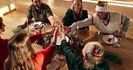 Family, Christmas and toast with champagne at dinner party, bonding or celebration with happy people in home. Sparkling wine, glasses and cheers with group for festive holiday, gathering and drinks
