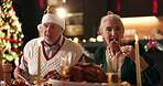 Christmas, family lunch and old couple eating with talking for celebration, dinner party or bonding. Thanksgiving, food feast or people with social gathering at night for holiday tradition or festive