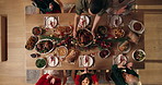Applause, family and christmas dinner in home for festive celebration, event or party together. Food, top view and people in dining room with clapping hands for gourmet meal, feast or supper for xmas