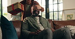 Woman, man and surprise present on sofa, cover eyes or happy with care, love and anniversary in home. Mature African couple, gift box and partner with gratitude, wow or smile on birthday in house